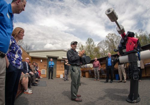 Astronomer talking at the observatory
